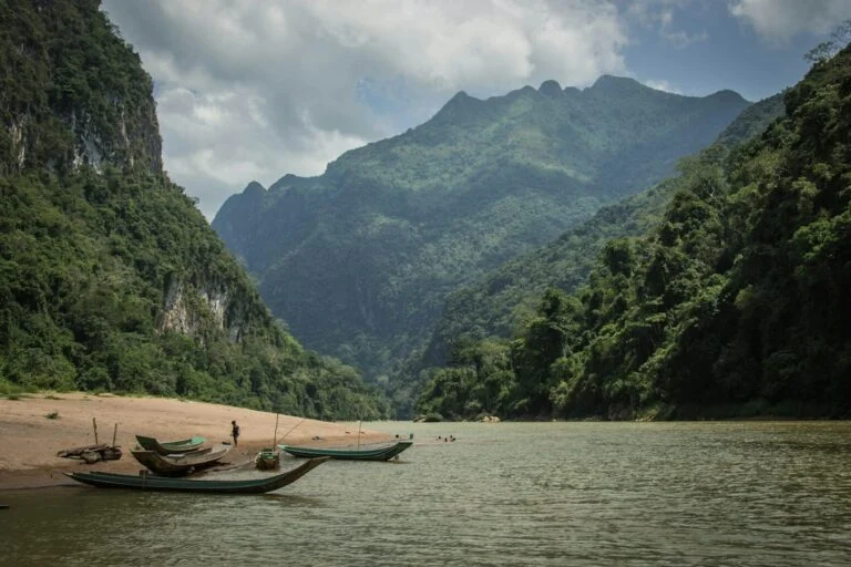Boats by a river — illustrative photograph