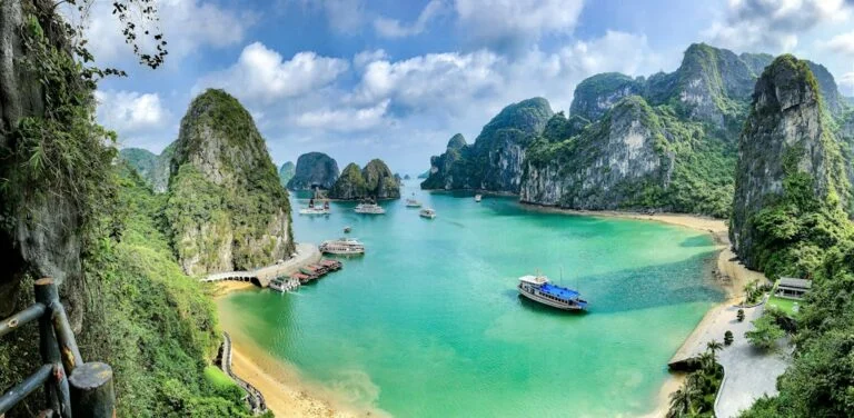 Limestone islands and calm water in Halong Bay